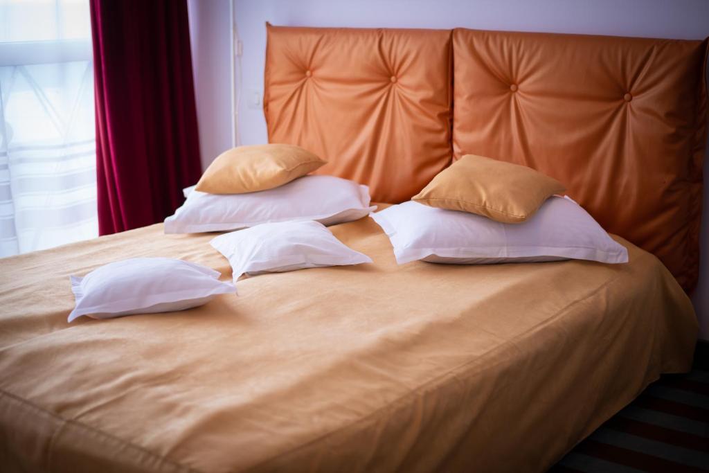 Postel nebo postele na pokoji v ubytování Hotel Opal