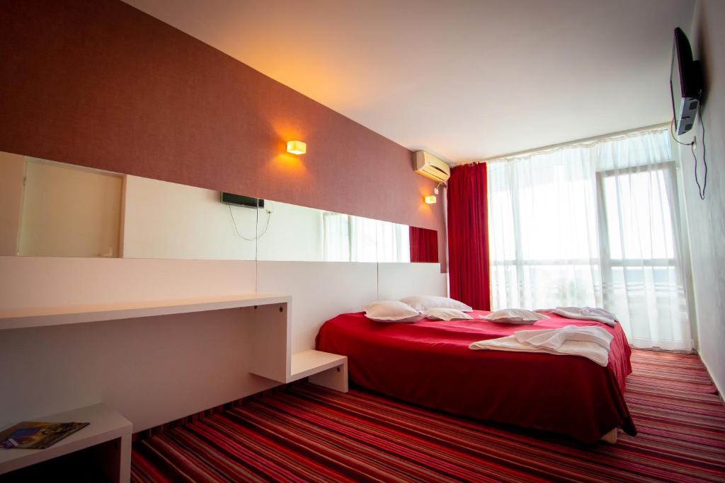 Postel nebo postele na pokoji v ubytování Hotel Opal