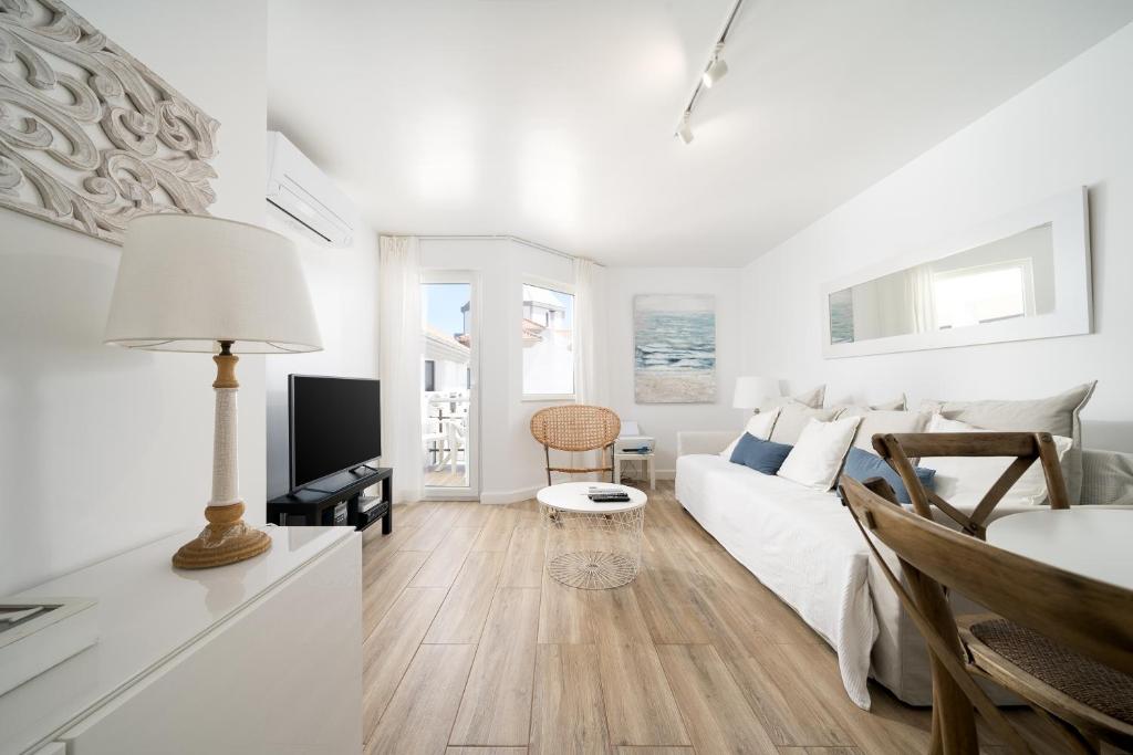 Et tv og/eller underholdning på Vilamoura Marina Apartment with swimming pool