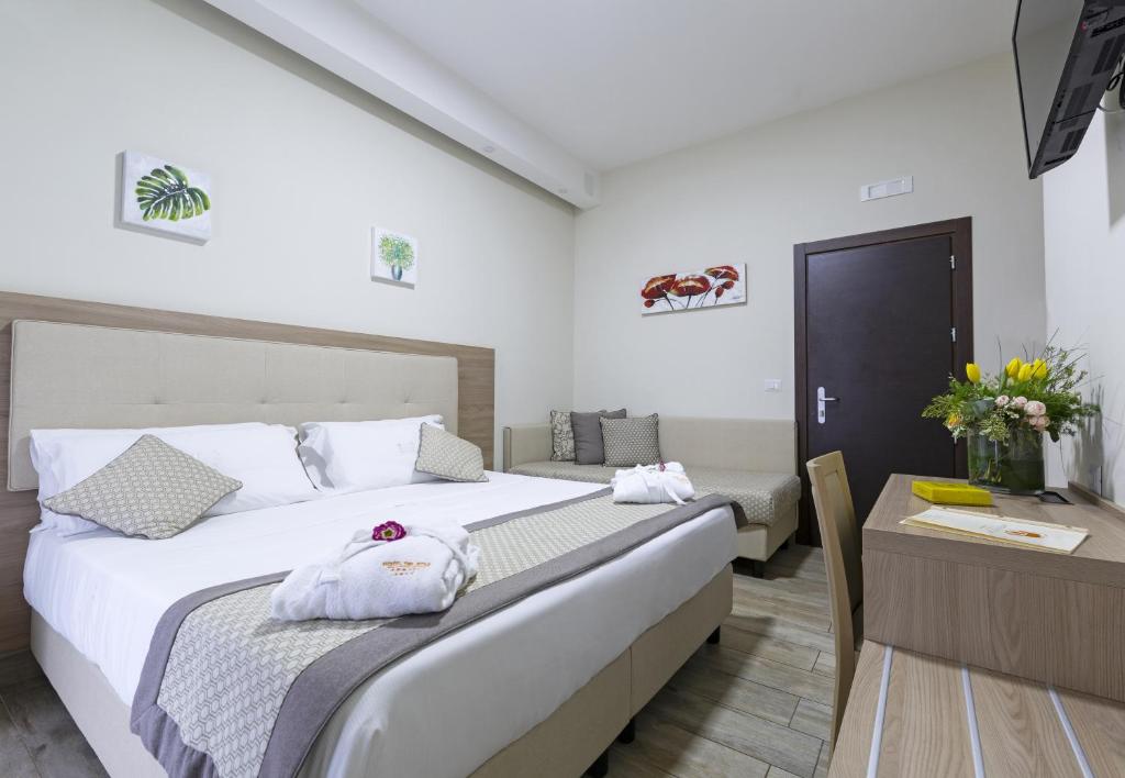 Letto o letti in una camera di Hotel del Sole
