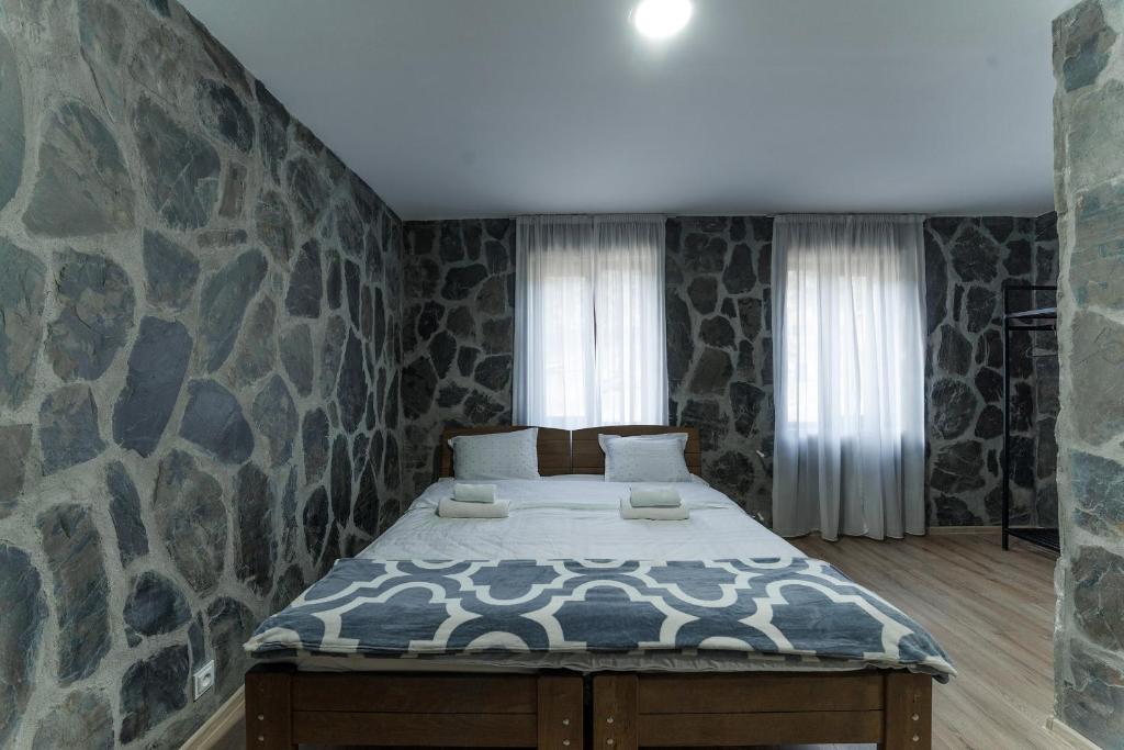 Postel nebo postele na pokoji v ubytování Hotel Complex Nabadi