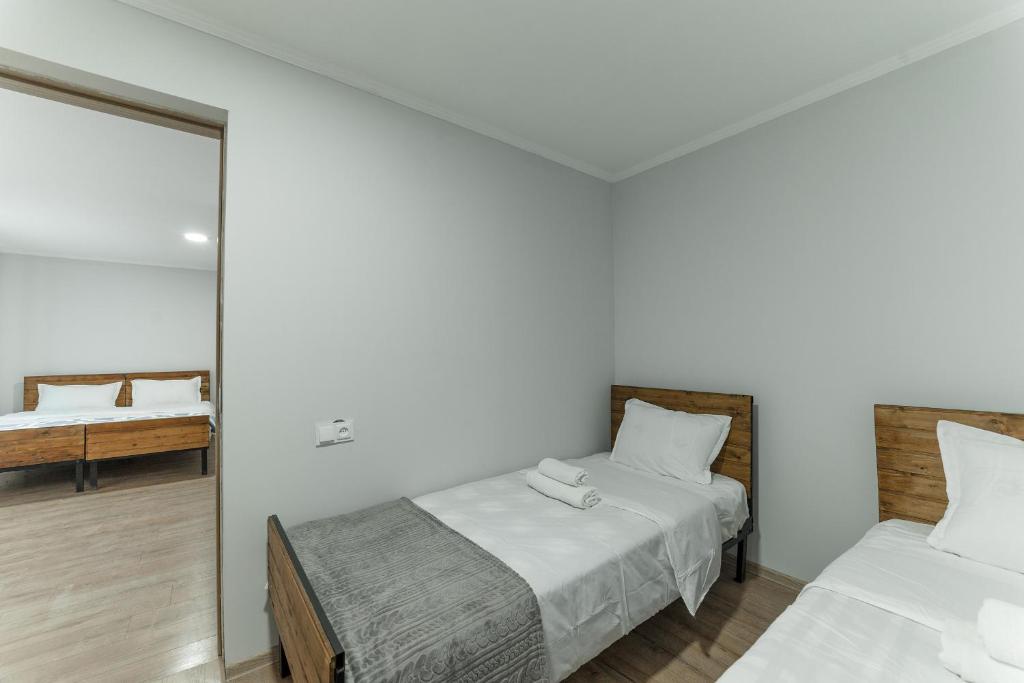 Postel nebo postele na pokoji v ubytování Hotel Complex Nabadi
