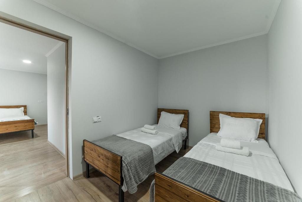 Postel nebo postele na pokoji v ubytování Hotel Complex Nabadi