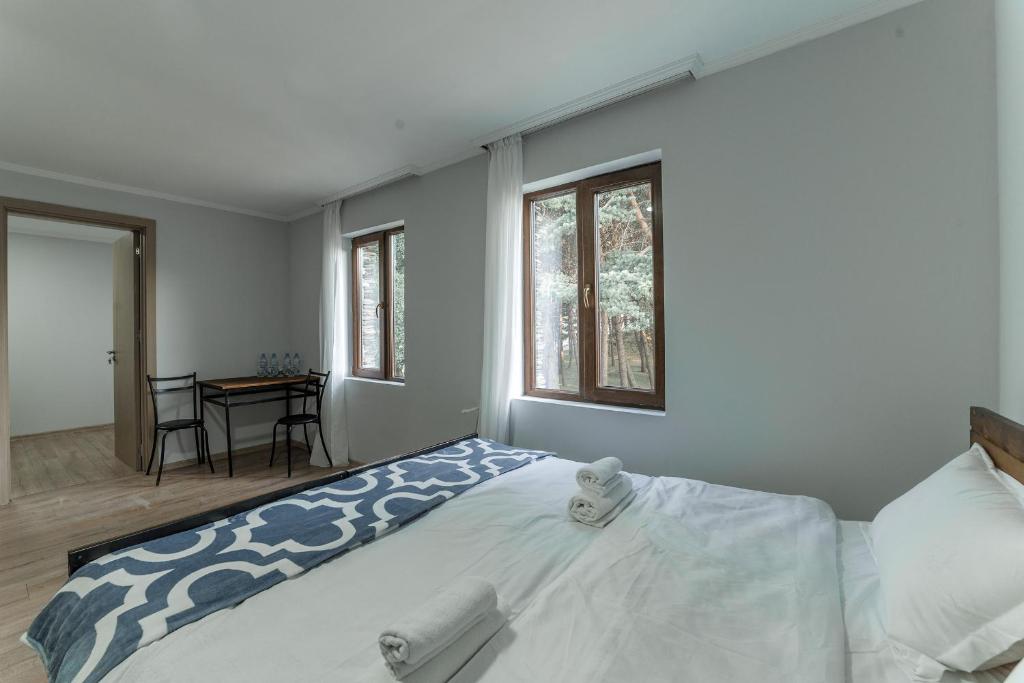 Postel nebo postele na pokoji v ubytování Hotel Complex Nabadi