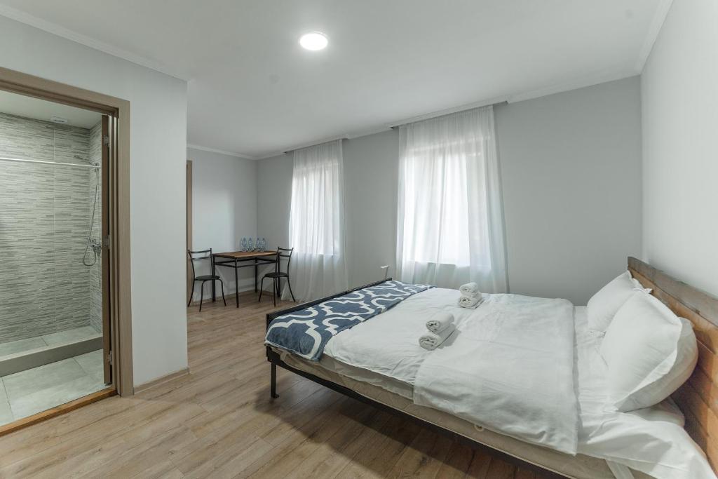 Postel nebo postele na pokoji v ubytování Hotel Complex Nabadi