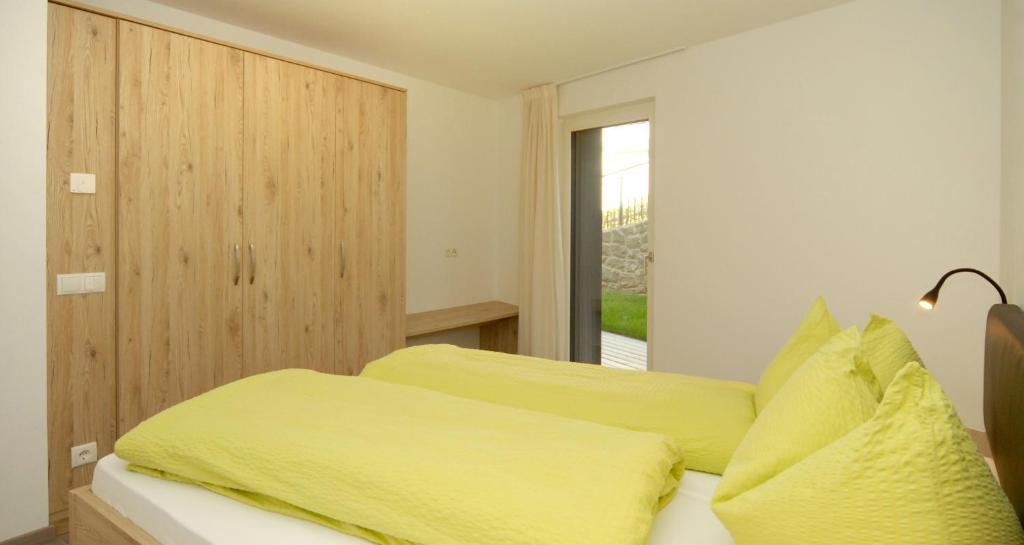 Postel nebo postele na pokoji v ubytování Appartment Charly