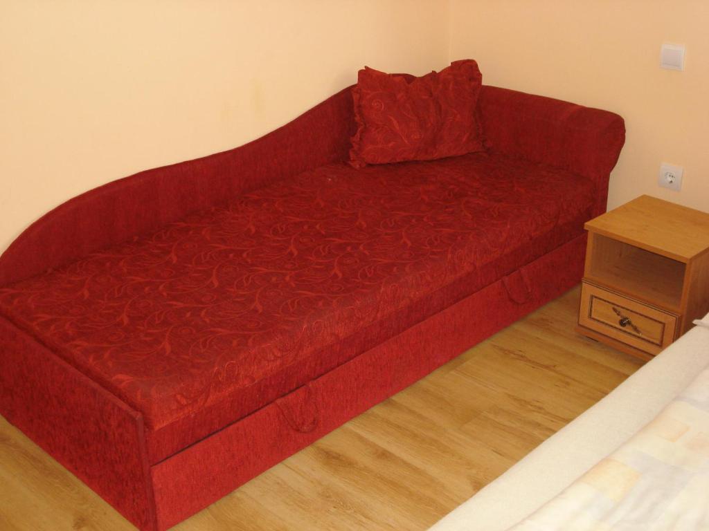 Łóżko lub łóżka w pokoju w obiekcie Sunshine Apartment