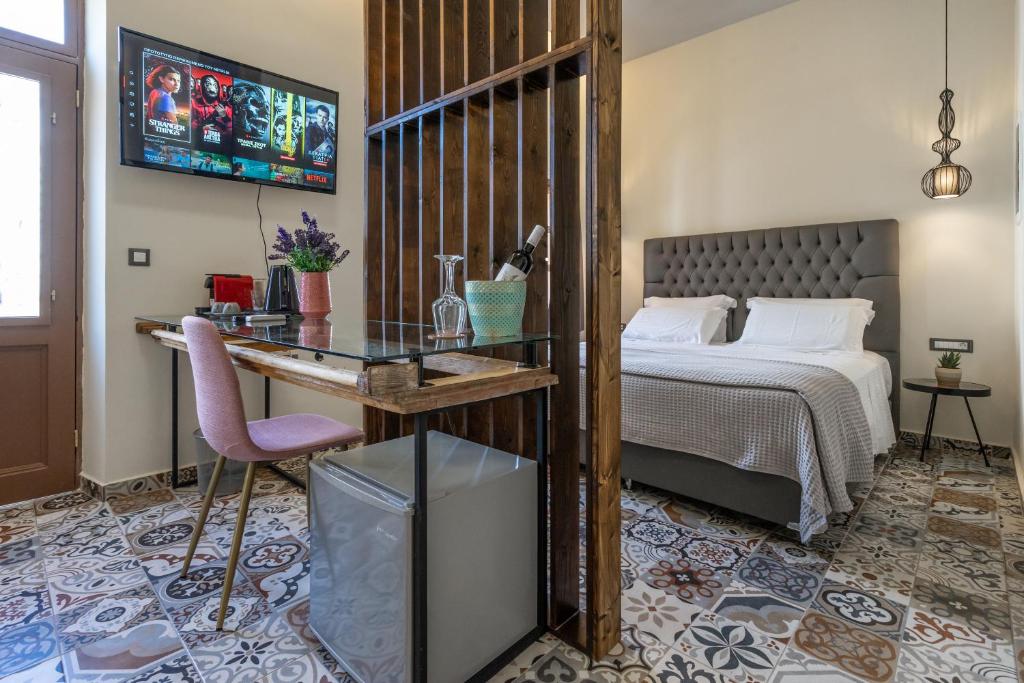 Postel nebo postele na pokoji v ubytování Casa Poli Suites