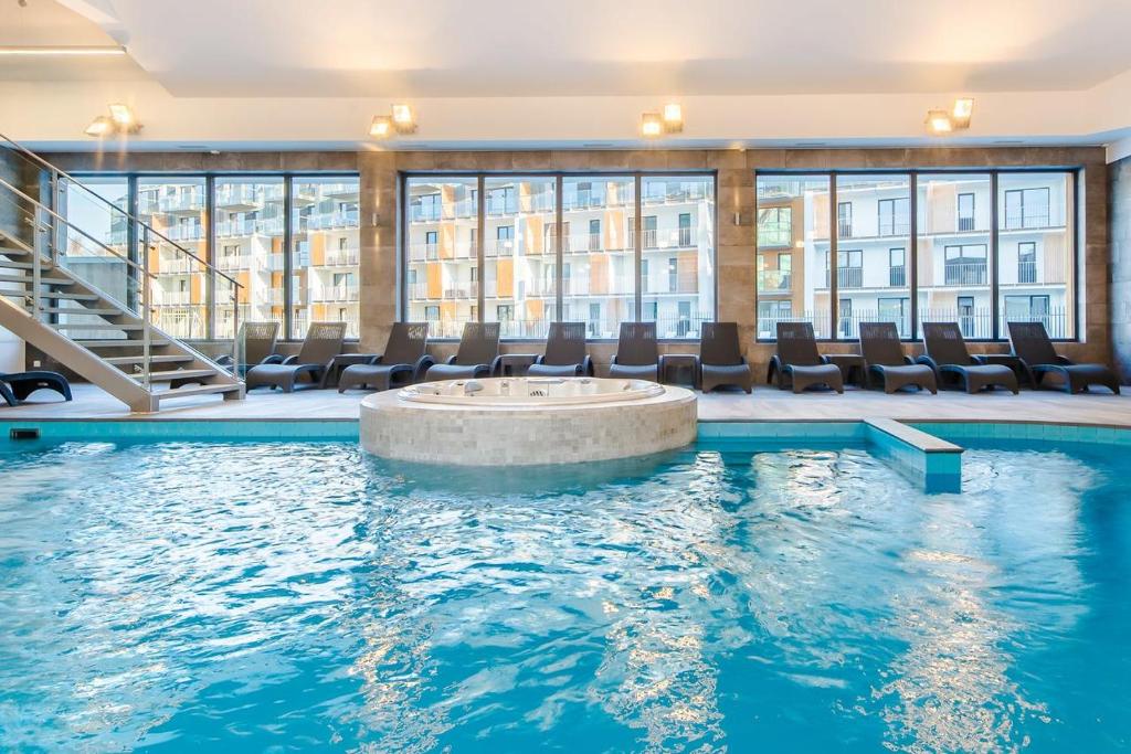 Bazén v ubytovaní Apartament Happy Time SPA - Kołobrzeg alebo v jeho blízkosti