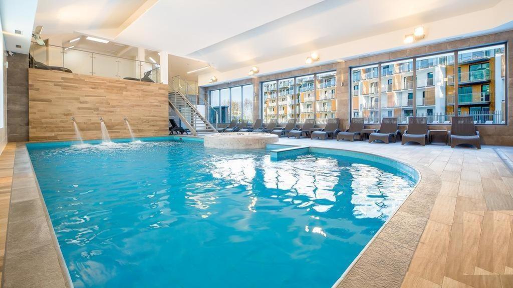 Bazén v ubytovaní Apartament Happy Time SPA - Kołobrzeg alebo v jeho blízkosti