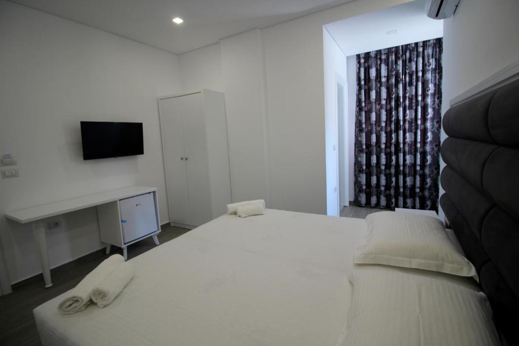 Postel nebo postele na pokoji v ubytování Edina by Hp Hotel