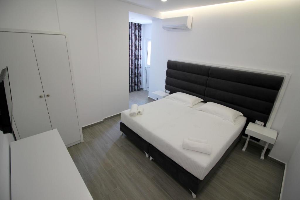 Postel nebo postele na pokoji v ubytování Edina by Hp Hotel