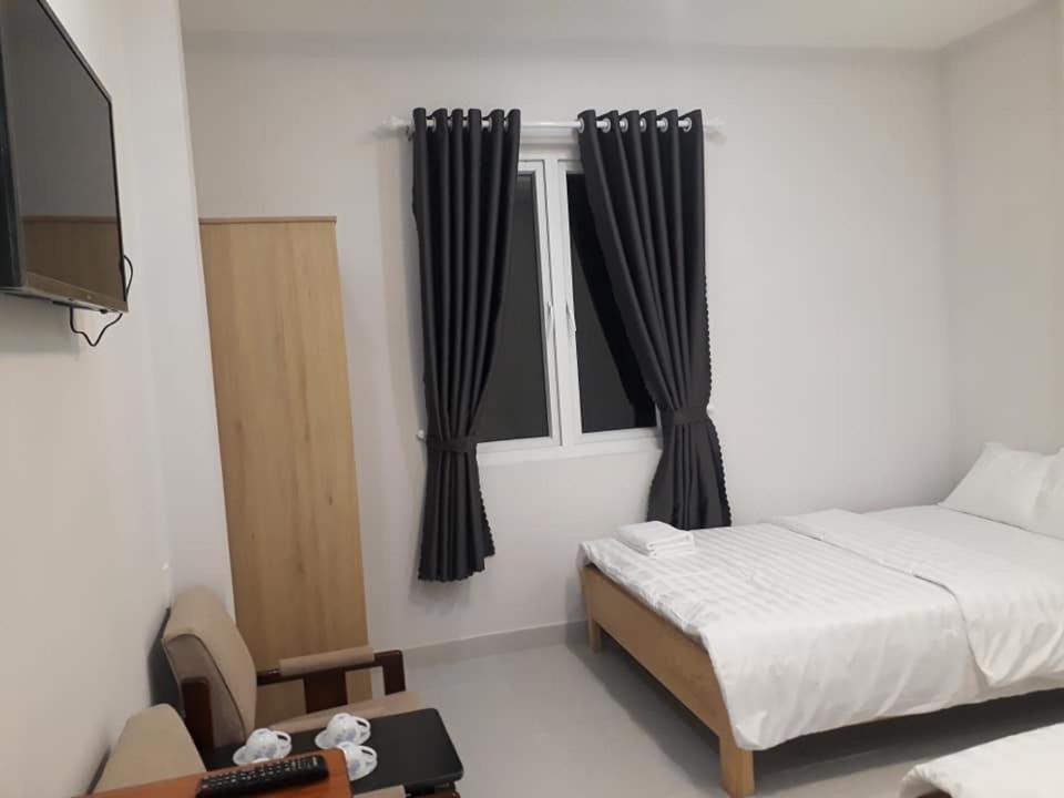 Katil atau katil-katil dalam bilik di Guest house Hai Cô Chú