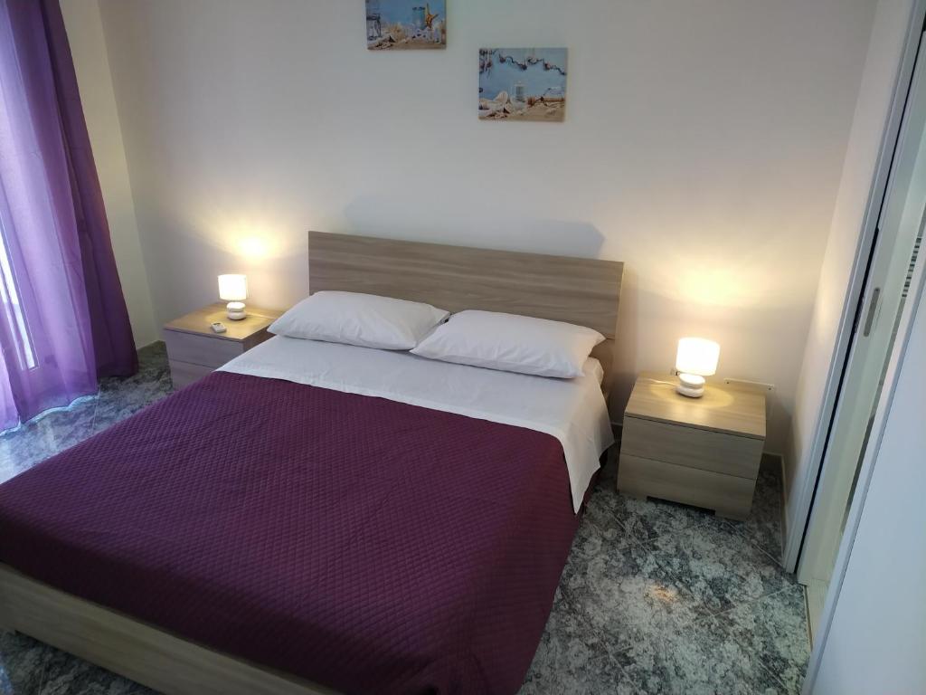 Postel nebo postele na pokoji v ubytování B&B Civico 42