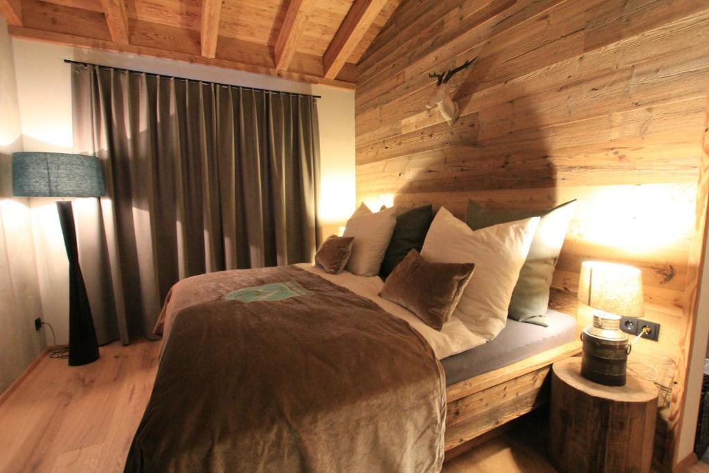 Posteľ alebo postele v izbe v ubytovaní Mountain Chalet R