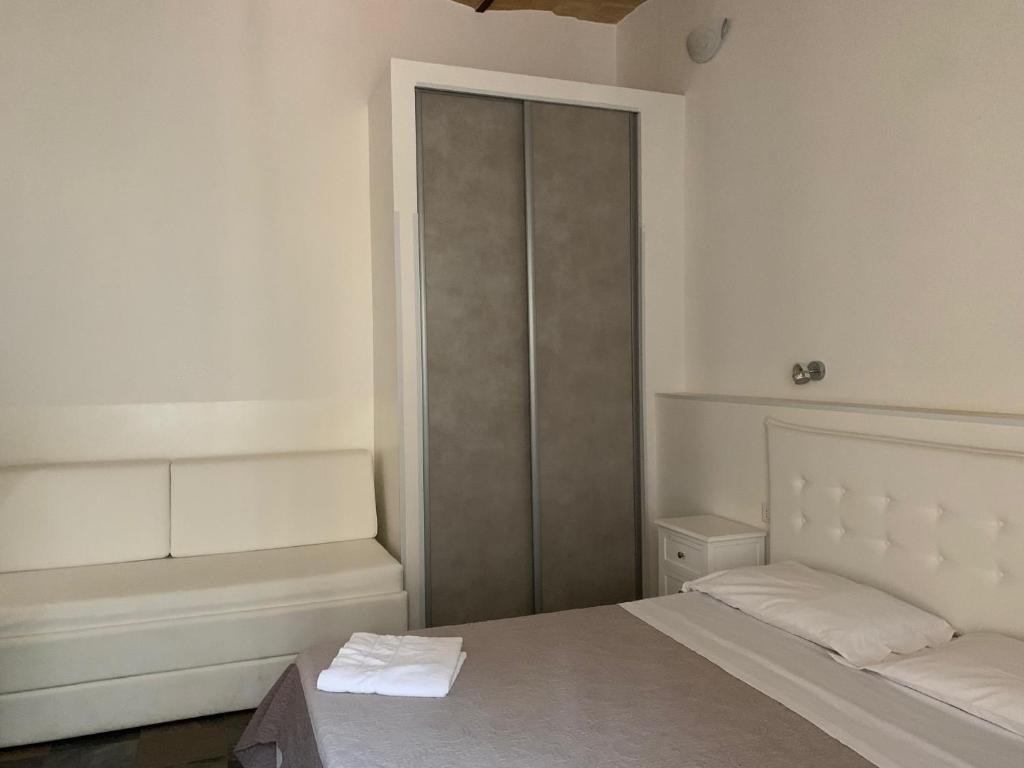 Łóżko lub łóżka w pokoju w obiekcie Golden Nice Apartment