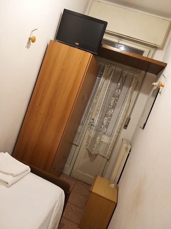 Postel nebo postele na pokoji v ubytování Hotel Amba Alagi