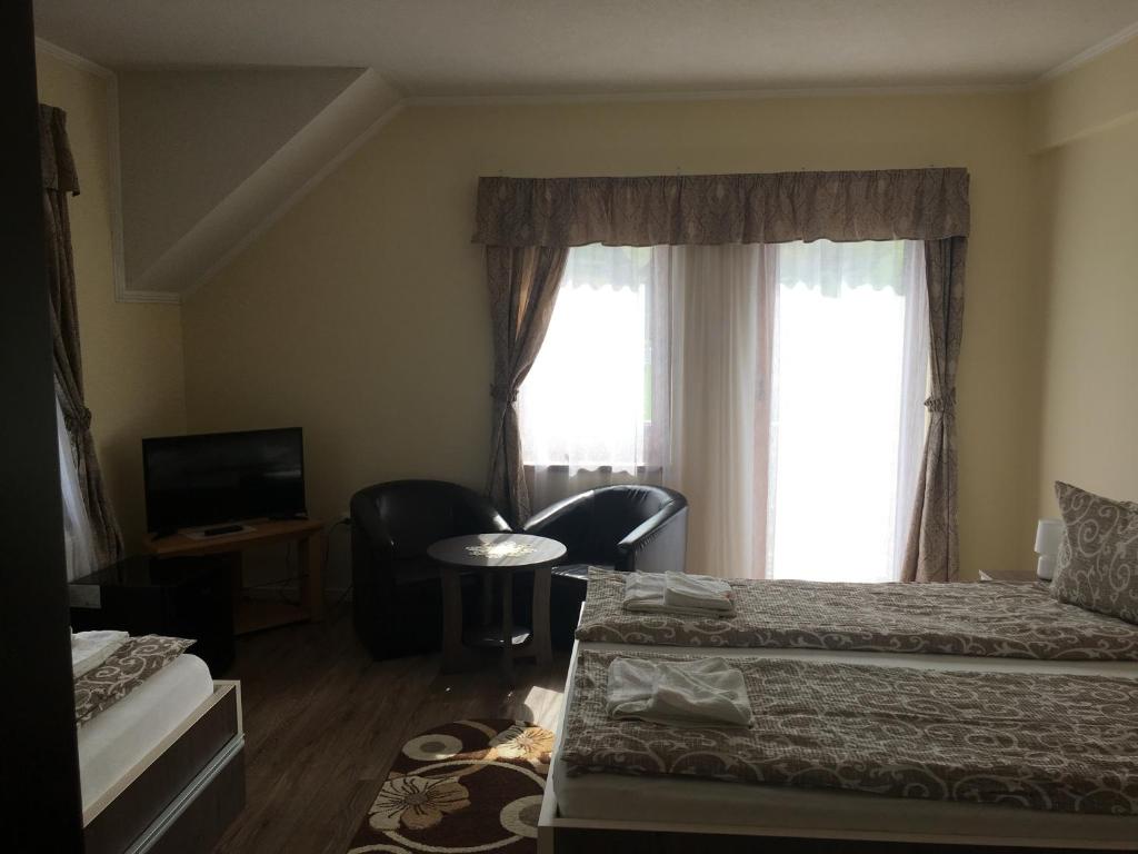 Letto o letti in una camera di Farkas Panzió