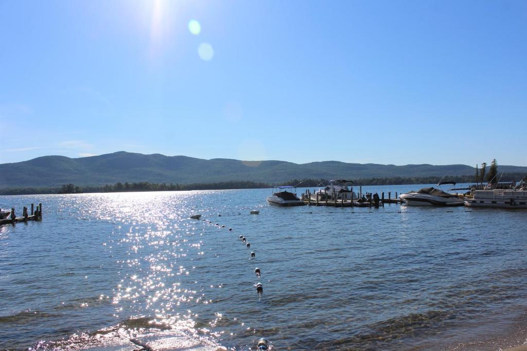 a large body of water with boats in it at Blue Lagoon Resort in Lake George