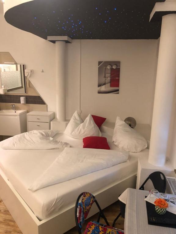 Postel nebo postele na pokoji v ubytování Center Rooms Villach