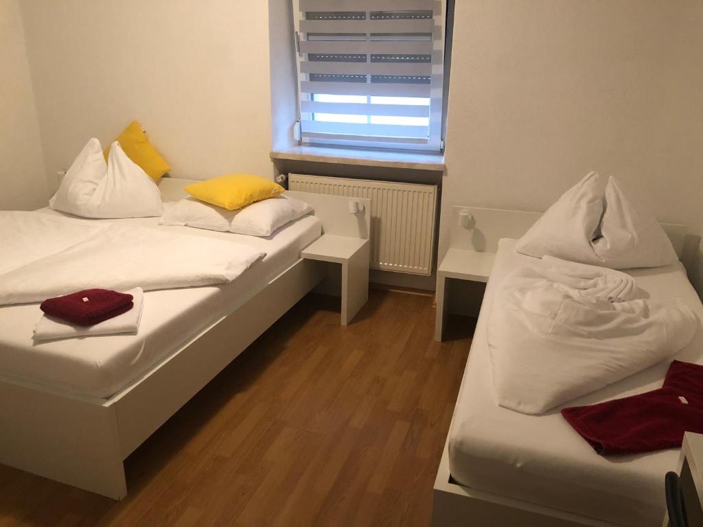 Postel nebo postele na pokoji v ubytování Center Rooms Villach