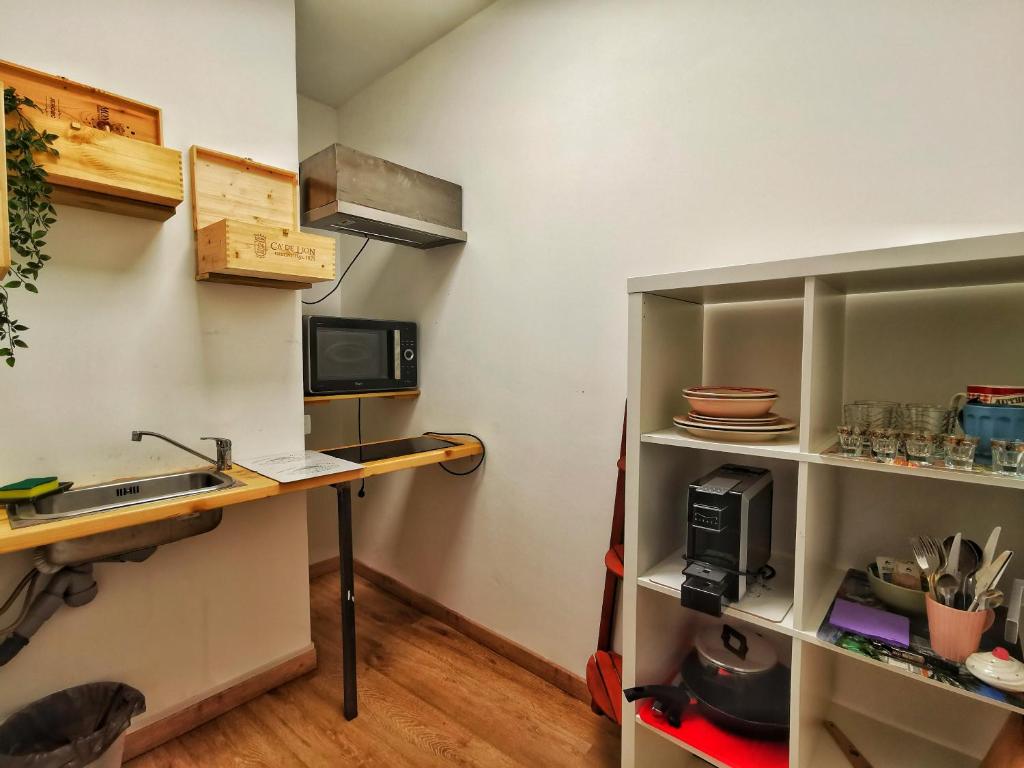 Kuchyň nebo kuchyňský kout v ubytování Regis B&B Appartamenti centro storico