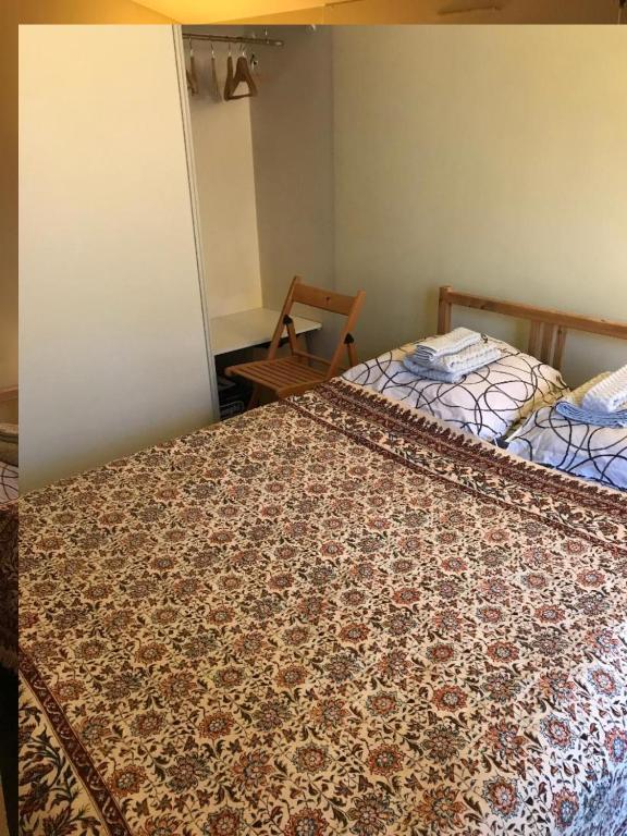Postel nebo postele na pokoji v ubytování DREAM Flat in PARIS