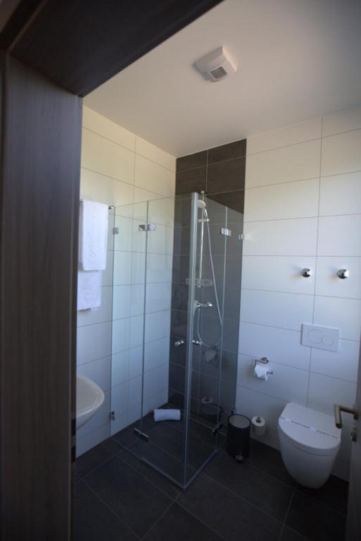 Koupelna v ubytování Hotel LACIN