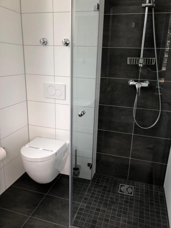 Koupelna v ubytování Hotel LACIN