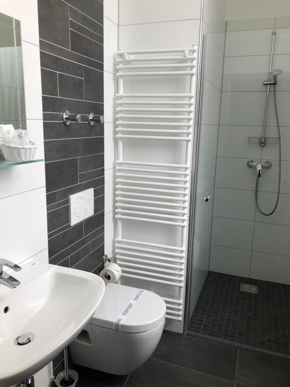Koupelna v ubytování Hotel LACIN