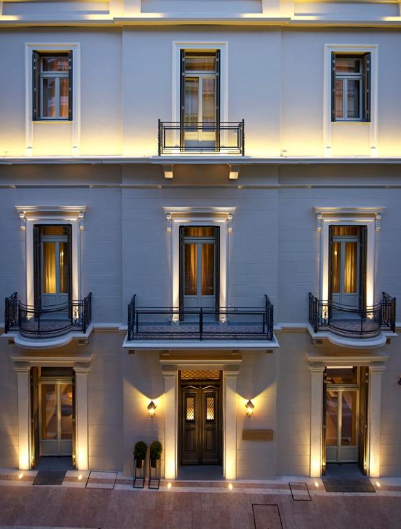 a large white building with a bunch of windows at Marpessa Hotel & Spa in Agrinion