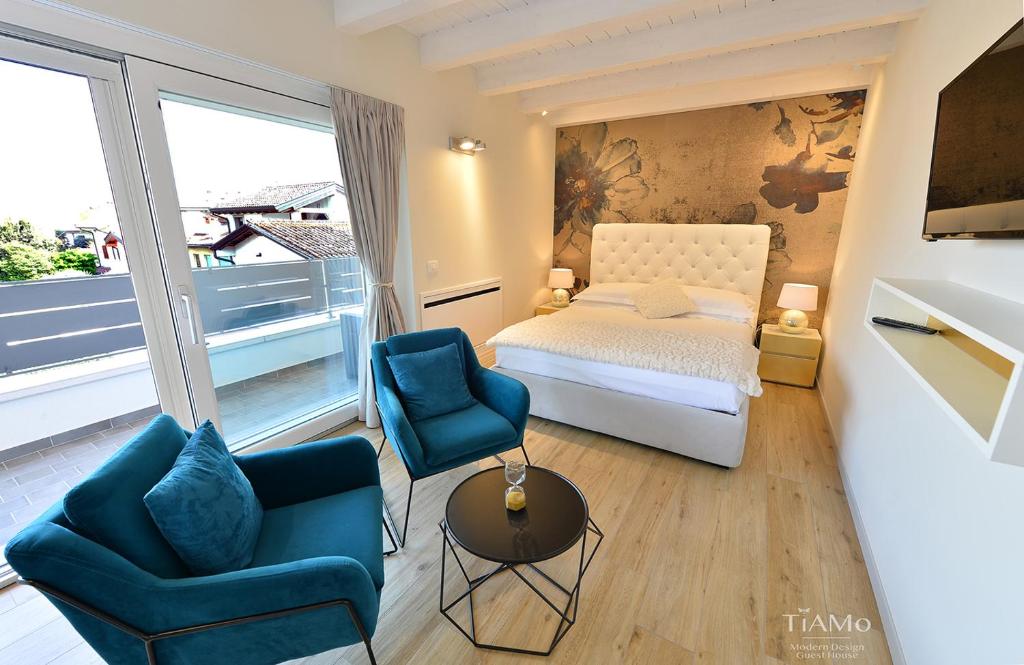 Posteľ alebo postele v izbe v ubytovaní TiAMo Modern Design Guest House