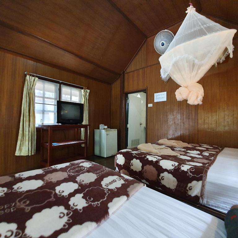 Postel nebo postele na pokoji v ubytování Silver Sands Resort - Koh Tao