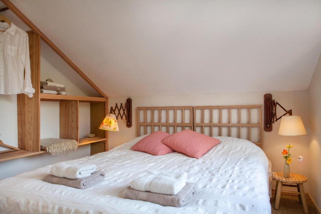 Postel nebo postele na pokoji v ubytování Ecolodge de Parel Schoorl