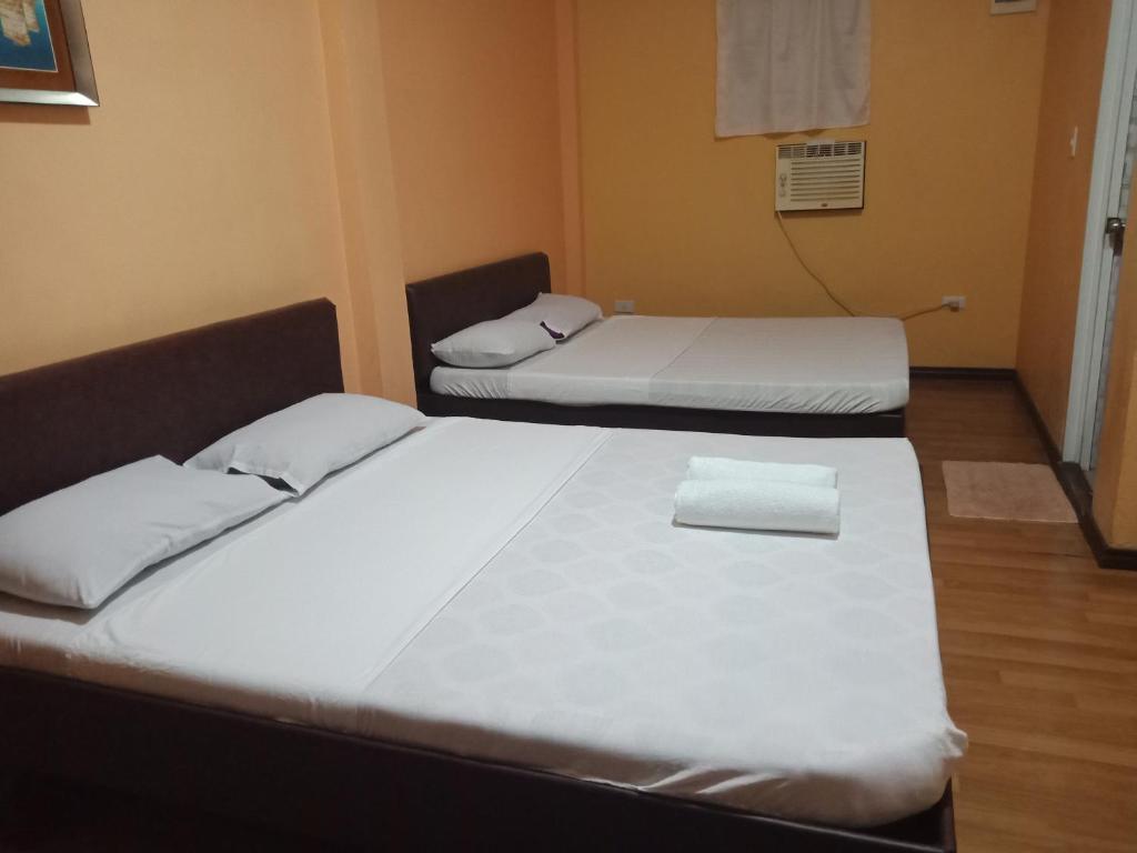 Postel nebo postele na pokoji v ubytování Lagnason's Place
