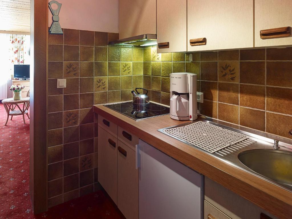 Kuchyň nebo kuchyňský kout v ubytování Appartementhaus Holiday