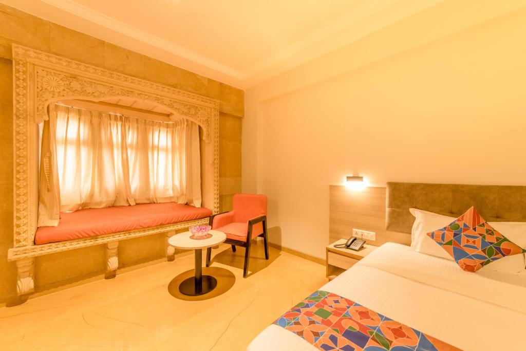 Postel nebo postele na pokoji v ubytování Hotel Antra Inn