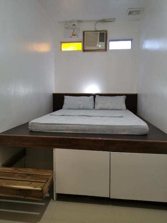 Postel nebo postele na pokoji v ubytování One Hostel - El Nido