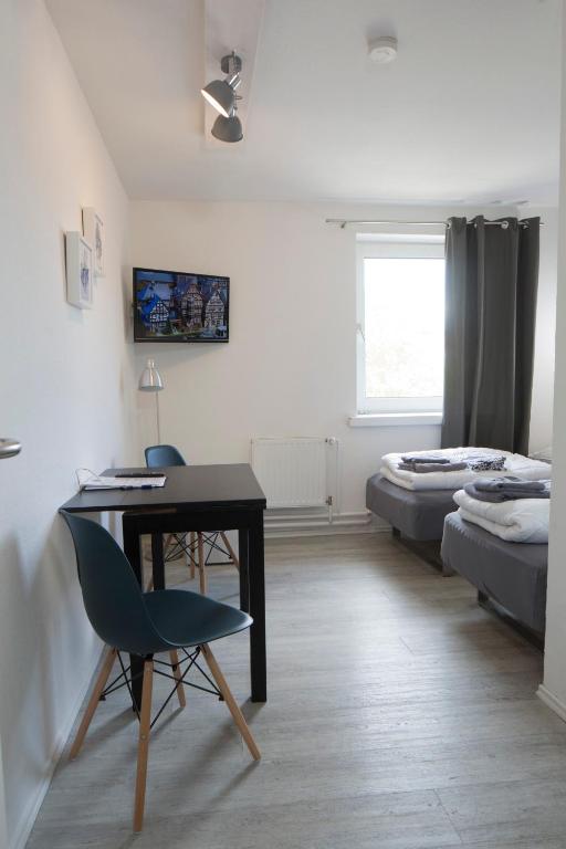 Postel nebo postele na pokoji v ubytování Flensbed Hotel & Hostel