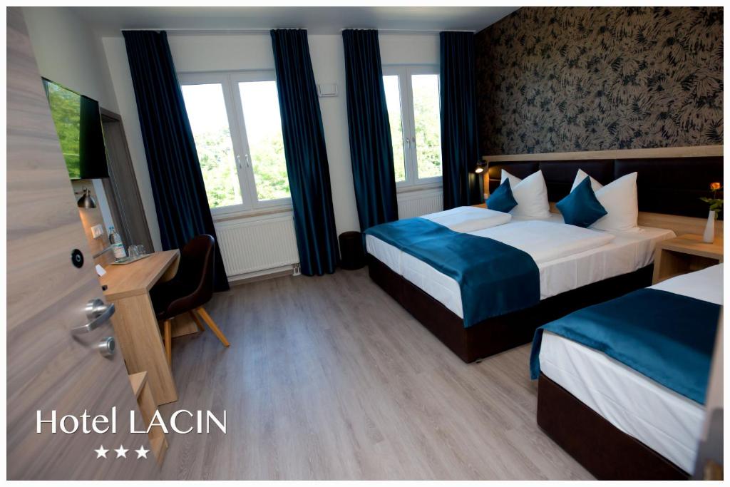 Postel nebo postele na pokoji v ubytování Hotel LACIN
