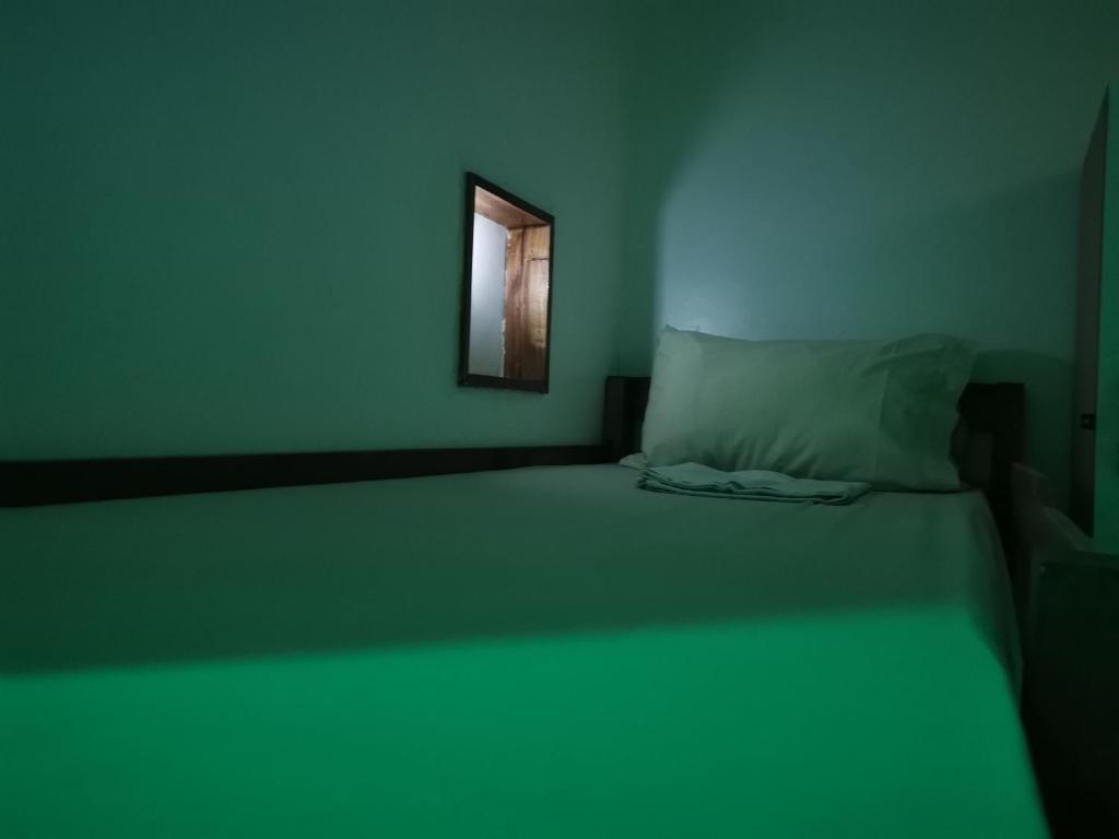 Postel nebo postele na pokoji v ubytování One Hostel - El Nido