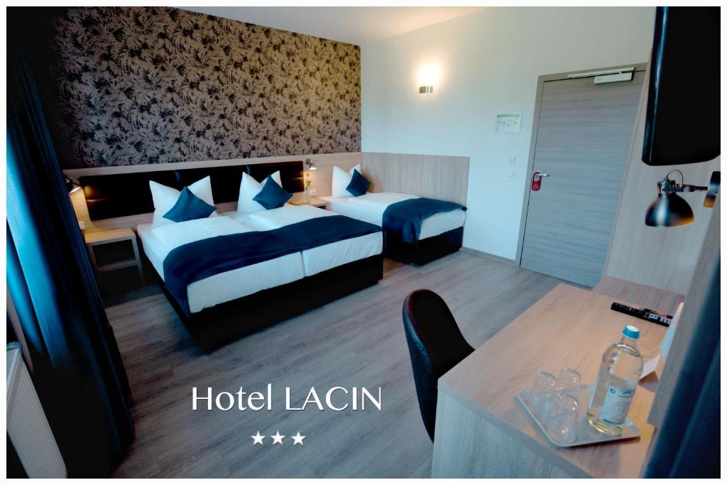 Postel nebo postele na pokoji v ubytování Hotel LACIN