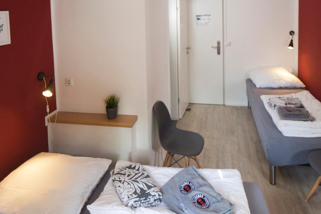 Postel nebo postele na pokoji v ubytování Flensbed Hotel & Hostel