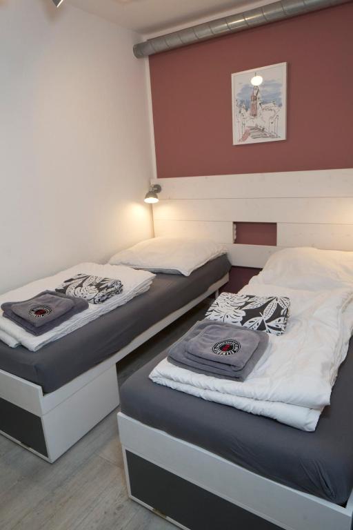 Postel nebo postele na pokoji v ubytování Flensbed Hotel & Hostel