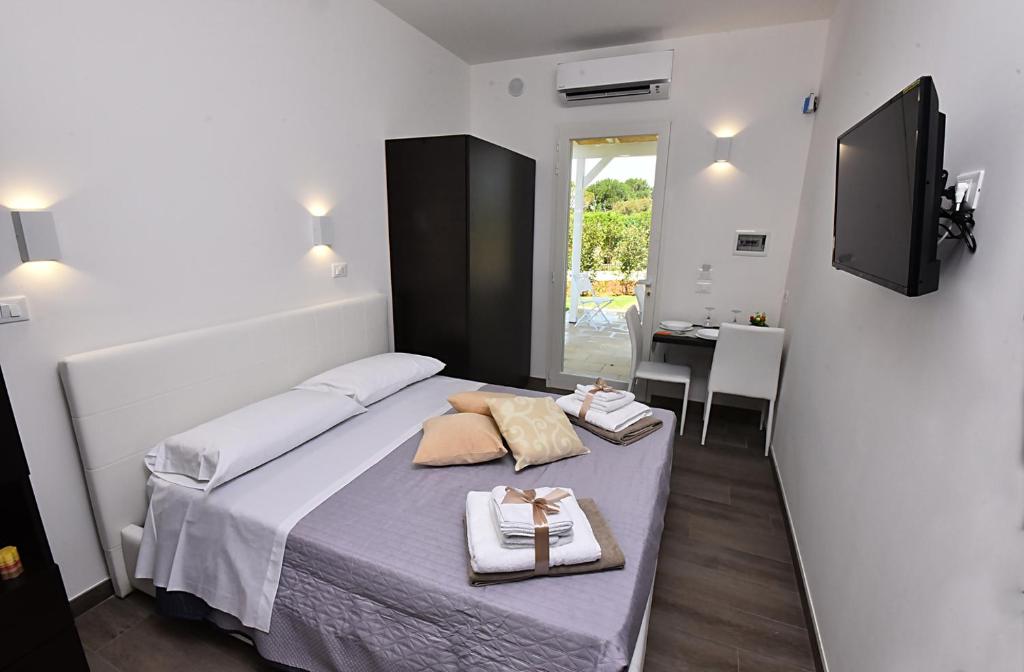 Postel nebo postele na pokoji v ubytování Borgo Fiorito Relais