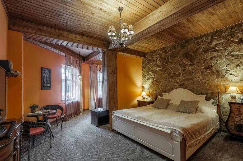 Säng eller sängar i ett rum på Guest House Blizhnie Dubki