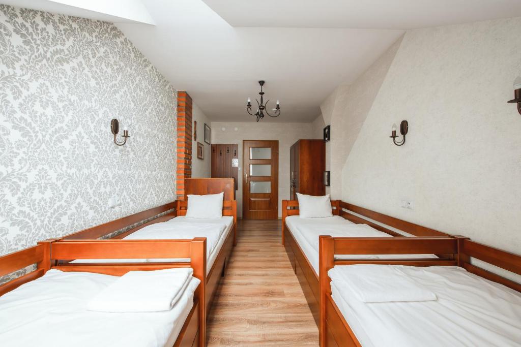 Posteľ alebo postele v izbe v ubytovaní Ginger ApartHostel