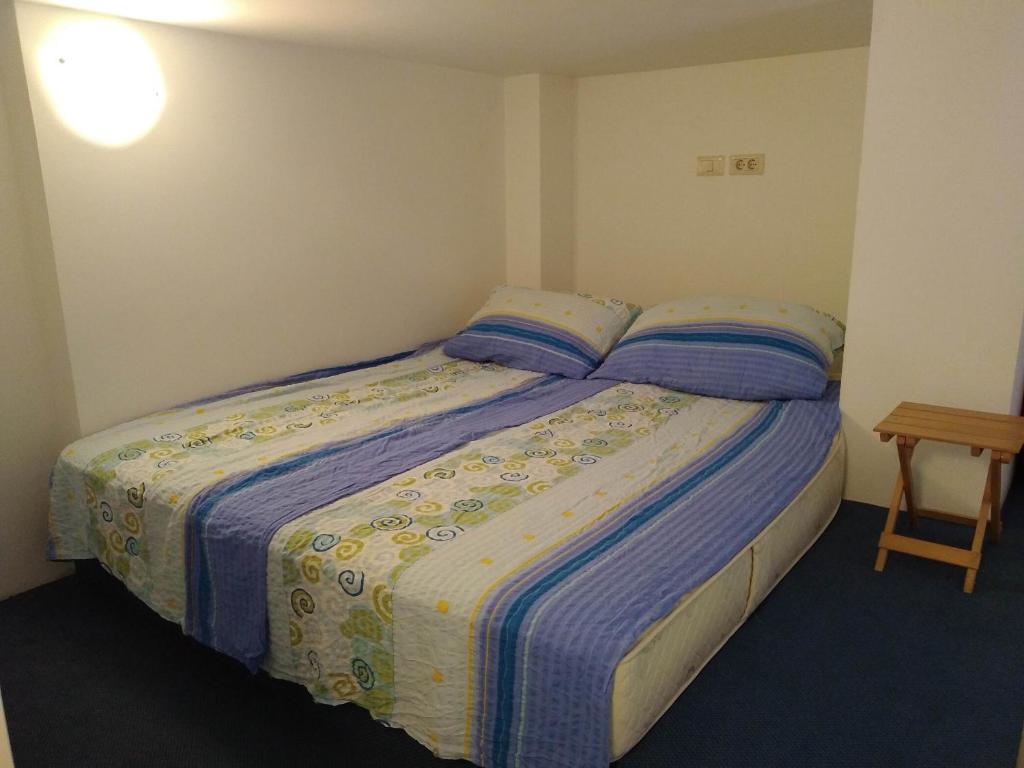 Postel nebo postele na pokoji v ubytování Central Residence