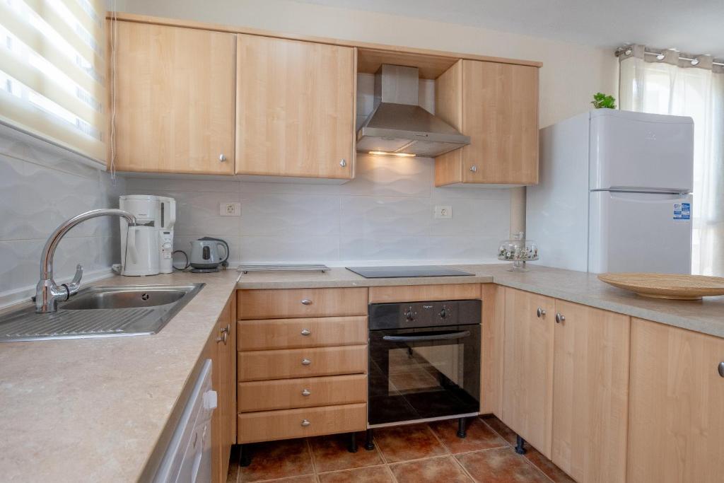 Kuchyň nebo kuchyňský kout v ubytování Villa Orquídea