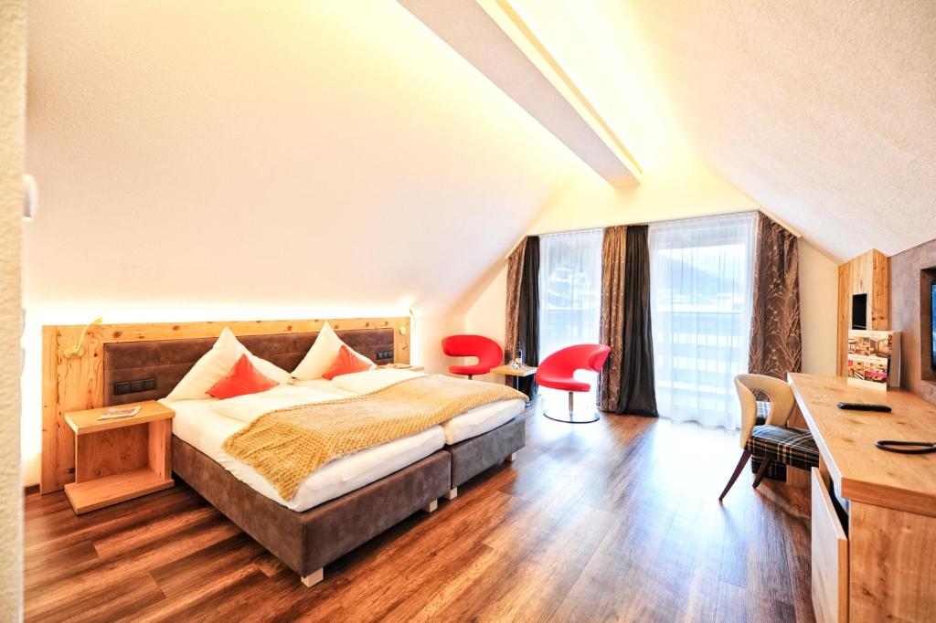 Postel nebo postele na pokoji v ubytování Hotel Ferienglück